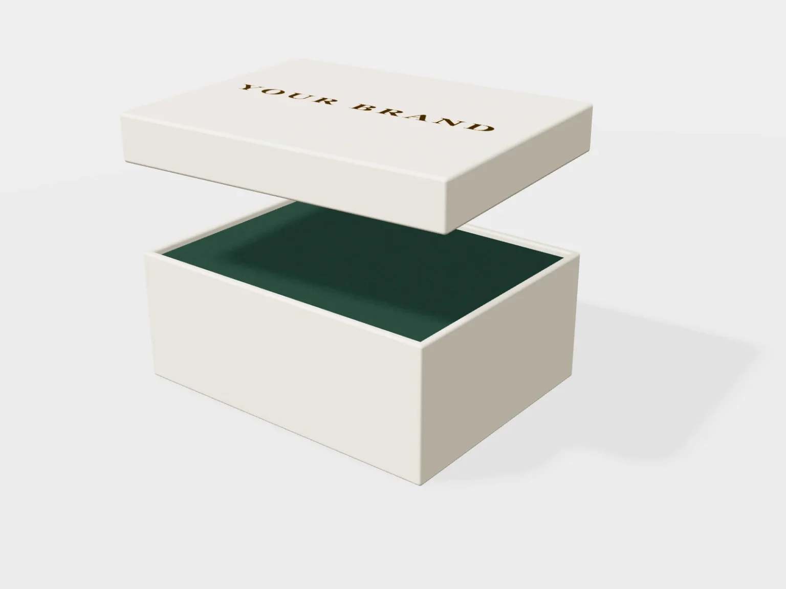 Close view of a cream rigid box showing the wrapped edges and foil logo
